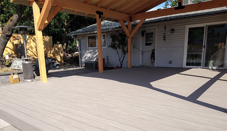Composite deck under patio cover