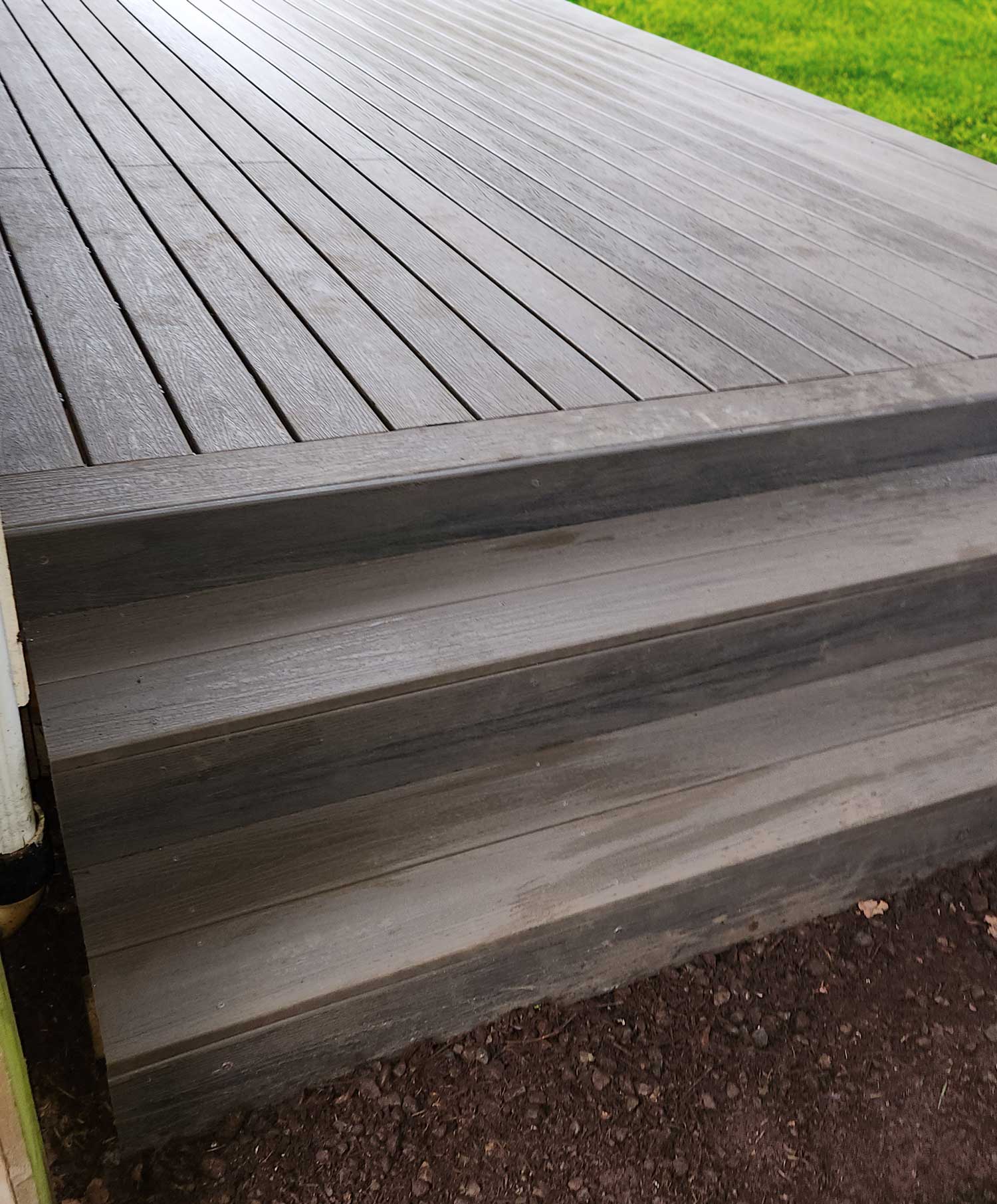 Steps to backyard porch.